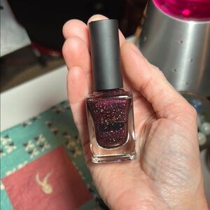 ILNP Ultra Holographic Nail Polish in Carrie, a Deep Glittery Red